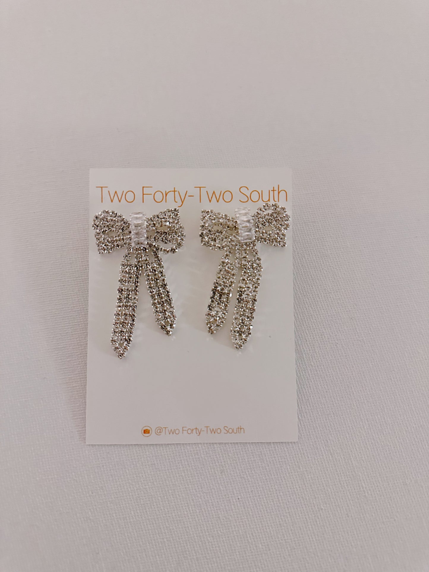 Bow earrings in silver